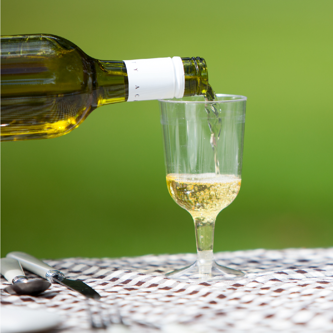 White wine pouring into Wine Glass